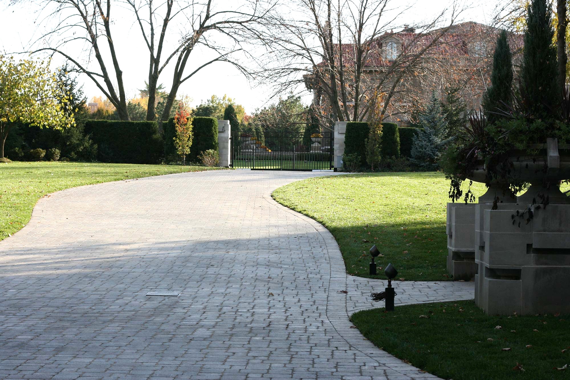 Brick and paver driveway entrance built by Outlook Hardscape